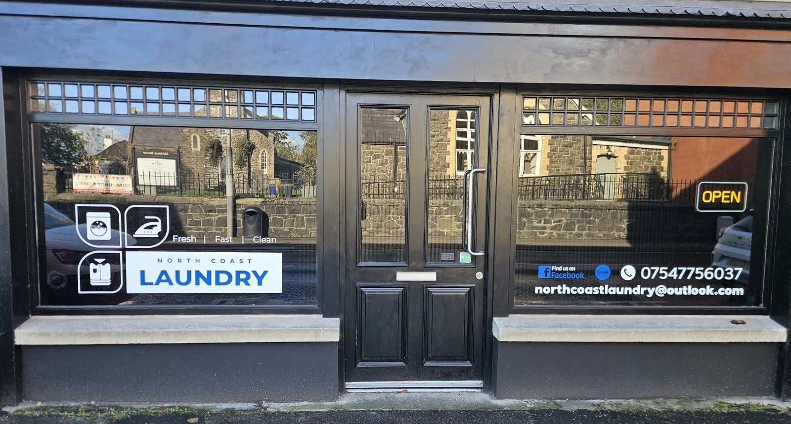 The North Coast Laundry shopfront at 8 Victoria Street, Ballymoney